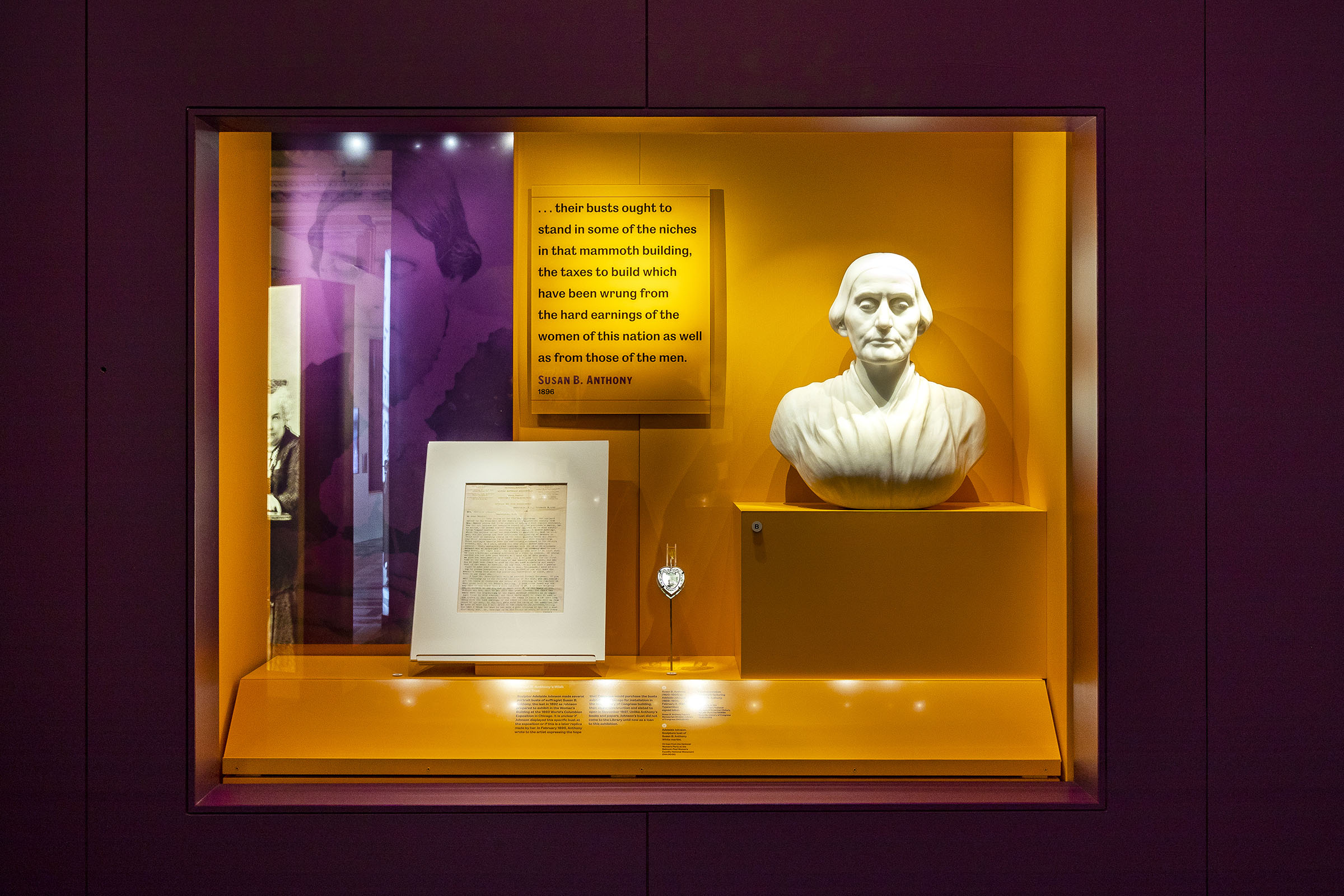 Shall Not Be Denied Exhibition. P+A recommended a color palette that would both harmonize with the southwest curtain’s floor and walls and honor the American suffragists, who used the colors purple and yellow.